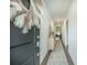 Entryway view with hardwood floors, modern light fixtures, decorative rug and wall decor at 293 Firewheel Ct, Summerville, SC 29486