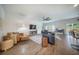 Open-concept living room with hardwood floors, ceiling fan and modern furnishings at 293 Firewheel Ct, Summerville, SC 29486