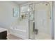 This bathroom features both a soaking tub and separate glass enclosed shower at 3001 Grand Bay Ln, Johns Island, SC 29455