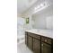 This bathroom features a single sink vanity with neutral walls and a tub-shower combo at 3001 Grand Bay Ln, Johns Island, SC 29455