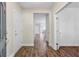 Entry hallway with attractive wood flooring, white trim, and neutral wall paint at 3001 Grand Bay Ln, Johns Island, SC 29455