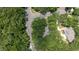 Aerial view of property with winding street amid mature trees at 3023 Maritime Forest Dr, Johns Island, SC 29455