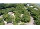 Aerial view of home surrounded by trees, with a long drive at 3023 Maritime Forest Dr, Johns Island, SC 29455
