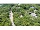 Aerial view highlights home's location amid mature trees at 3023 Maritime Forest Dr, Johns Island, SC 29455