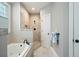 Nicely remodeled bathroom with shower, tub, and tile at 3023 Maritime Forest Dr, Johns Island, SC 29455