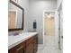 Bathroom features modern vanity, mirror, and doorway to bedroom at 3023 Maritime Forest Dr, Johns Island, SC 29455