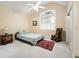 Bedroom with vaulted ceiling, ceiling fan, window with shutters, and furniture at 3023 Maritime Forest Dr, Johns Island, SC 29455