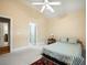 Bedroom with vaulted ceiling, ceiling fan, and view to hallway at 3023 Maritime Forest Dr, Johns Island, SC 29455