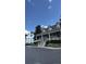 Inviting clubhouse exterior with well-maintained landscaping and a welcoming entrance at 3023 Maritime Forest Dr, Johns Island, SC 29455