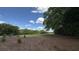 Scenic golf course view with lush green grass, mature trees, and blue sky at 3023 Maritime Forest Dr, Johns Island, SC 29455