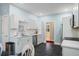 Bright kitchen featuring white cabinets, stainless appliances, and a breakfast nook with seating at 3023 Maritime Forest Dr, Johns Island, SC 29455