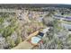 Lakes of Summerville community aerial view with a pool clubhouse surrounded by trees at 318 Seneca River Dr, Summerville, SC 29485