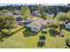 Elevated view of a home with trampoline, shed, and solar panels amidst a serene neighborhood setting at 318 Seneca River Dr, Summerville, SC 29485