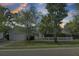Charming single-story home with a two-car garage and white picket fence at 318 Seneca River Dr, Summerville, SC 29485
