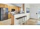Kitchen with a breakfast bar, stainless steel appliances, and ample cabinet space at 318 Seneca River Dr, Summerville, SC 29485