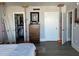 Bedroom featuring hardwood floors, a dresser, closet, and view of other rooms at 330 Concord St # 14D, Charleston, SC 29401