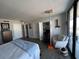 Cozy bedroom with a work space and chair at 330 Concord St # 14D, Charleston, SC 29401