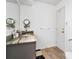 Bathroom features a vanity with a granite countertop and modern fixtures at 3308 Myrtle St, Edisto Beach, SC 29438