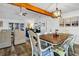 Dining table is open to a large living space at 3308 Myrtle St, Edisto Beach, SC 29438