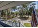 Inviting front porch with views of the landscaped front yard and street at 3308 Myrtle St, Edisto Beach, SC 29438