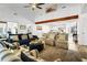 Open living space with a vaulted ceiling, beam, and plenty of seating at 3308 Myrtle St, Edisto Beach, SC 29438