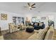 Comfortable living room with coastal decor, vaulted ceilings, and sliding glass doors at 3308 Myrtle St, Edisto Beach, SC 29438