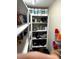 Walk-in pantry with ample shelving for plenty of storage at 3308 Myrtle St, Edisto Beach, SC 29438