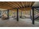 Covered outdoor area featuring a grill, lounge chairs, and space for relaxation and entertaining at 3308 Myrtle St, Edisto Beach, SC 29438