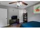 Bedroom featuring a ceiling fan, a shelved entertainment stand and tasteful decor at 3374 Dunwick Dr, Johns Island, SC 29455