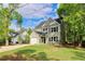 Charming two-story home with a well-manicured lawn and inviting curb appeal at 3374 Dunwick Dr, Johns Island, SC 29455