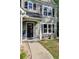 Inviting front entrance with a decorative wreath, landscaped garden, and visible house number at 3374 Dunwick Dr, Johns Island, SC 29455