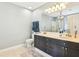 Stylish bathroom featuring double sinks, a vanity, and tile flooring at 339 Clayton Dr, Charleston, SC 29414