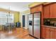Bright eat-in kitchen with stainless steel appliances and hardwood floors provides a cozy space to dine at 339 Clayton Dr, Charleston, SC 29414