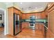 Spacious kitchen featuring stainless steel appliances, wood cabinets, and hardwood floors at 339 Clayton Dr, Charleston, SC 29414