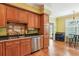 Lovely eat-in kitchen with stainless steel dishwasher, and hardwood floors at 339 Clayton Dr, Charleston, SC 29414