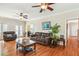 Comfortable living room with hardwood floors, ceiling fans, and views to a screened outdoor space at 339 Clayton Dr, Charleston, SC 29414