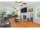Spacious living room with hardwood floors, a fireplace, and comfortable seating for relaxation at 339 Clayton Dr, Charleston, SC 29414