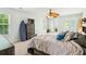 Comfortable bedroom featuring light walls, a ceiling fan, and balcony access at 339 Clayton Dr, Charleston, SC 29414