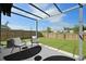 Outdoor patio with pergola, seating, and a well-maintained lawn, perfect for relaxing or entertaining guests at 341 Matuskovic Dr, Charleston, SC 29414