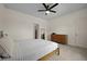 Bright bedroom featuring a ceiling fan, dresser and a closet, carpeted for warmth at 341 Matuskovic Dr, Charleston, SC 29414