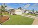 Charming single-story home features a one car garage, welcoming porch, beautiful lawn and lovely curb appeal at 341 Matuskovic Dr, Charleston, SC 29414