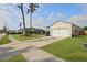 Charming single-story home features a one car garage, beautiful lawn, and lengthy driveway at 341 Matuskovic Dr, Charleston, SC 29414