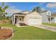 Charming single-story home features a one car garage and a welcoming front porch with inviting curb appeal at 341 Matuskovic Dr, Charleston, SC 29414