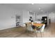 Bright, open kitchen has white cabinets, stainless steel appliances, and a dining area at 341 Matuskovic Dr, Charleston, SC 29414