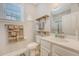 Well-lit bathroom with a vanity, toilet, and a shower with glass doors and a towel rack at 347 Prestwick Ct, Summerville, SC 29483