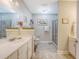 Well-lit bathroom with neutral tones, vanity, toilet, and a glass-enclosed shower at 347 Prestwick Ct, Summerville, SC 29483