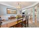 Spacious dining room flows to the living room and kitchen, creating an open floor plan at 347 Prestwick Ct, Summerville, SC 29483