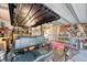 Garage with shelving, workbench, storage, and golf cart at 347 Prestwick Ct, Summerville, SC 29483