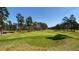 Golf course view with lush green grass, trees and sand trap at 347 Prestwick Ct, Summerville, SC 29483