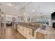 Open kitchen with granite countertops, stainless steel appliances, and views of the dining and living areas at 347 Prestwick Ct, Summerville, SC 29483